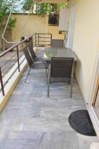Balkón alebo terasa v ubytovaní Filoxenia Apartment Athens + 11 fotografií