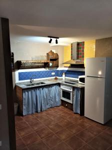 Kuchyň nebo kuchyňský kout v ubytování Casa Zapatero en Somontano