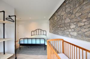 Кровать или кровати в номере Charming holiday house near Durbuy