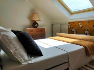 Кровать или кровати в номере Le 32