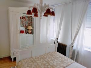 Postel nebo postele na pokoji v ubytování Le 32