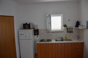Küche/Küchenzeile in der Unterkunft Apartments Burcul Pag