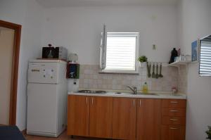 Küche/Küchenzeile in der Unterkunft Apartments Burcul Pag
