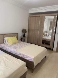Кровать или кровати в номере Palm Lake Resort Folla Monastir/Sousse