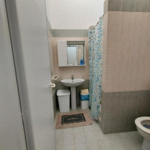 Koupelna v ubytování CasaVacanze Pescoluse Glicine