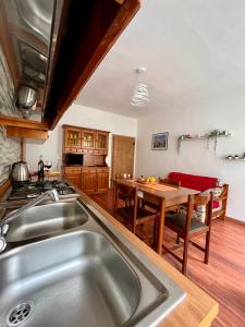 Kuchyň nebo kuchyňský kout v ubytování Cadore apartment