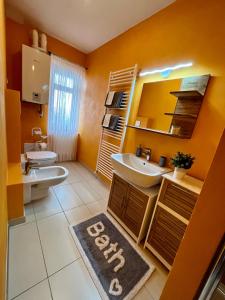 Koupelna v ubytování Cadore apartment