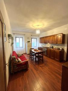 Kuchyň nebo kuchyňský kout v ubytování Cadore apartment