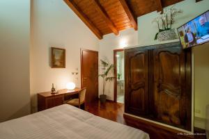 Posteľ alebo postele v izbe v ubytovaní Hotel Flora + 37 fotografií