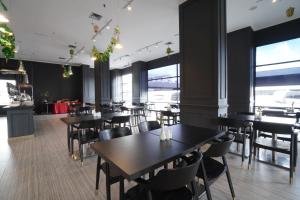 Restoran või mõni muu söögikoht majutusasutuses Swiss-Belinn Cawang