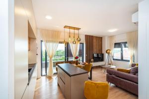 Posezení v ubytování PANORAMA DELUXE APARTMENT