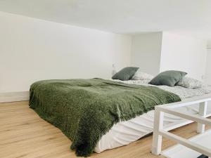 Postel nebo postele na pokoji v ubytování V City Studios