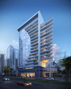a rendering of a tall building in a city at The First Collection Business Bay in Dubai