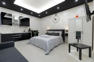 Postel nebo postele na pokoji v ubytování Suite16 & spa