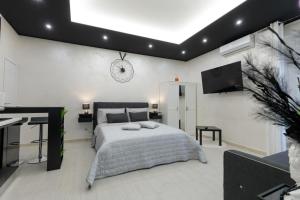 Postel nebo postele na pokoji v ubytování Suite16 & spa