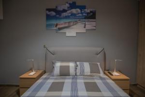 Postel nebo postele na pokoji v ubytování Max Blue apartment, a stay like no other