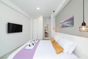 Postel nebo postele na pokoji v ubytování Villa Zaneti by PosarelliVillas