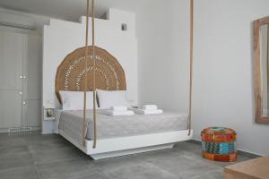 Postel nebo postele na pokoji v ubytování Kastro Antiparos + 37 fotografií