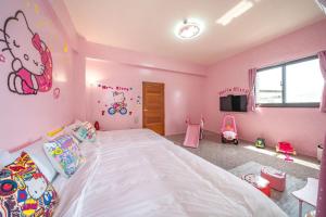 Rúm í herbergi á Cute ohpa BnB