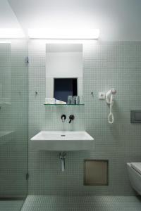 Un baño de Hotel Atom Třebíč