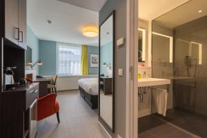 Bilik mandi di Thon Hotel EU