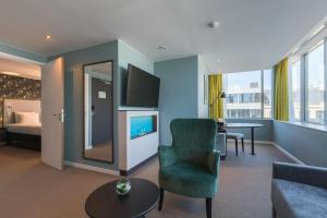 Televisyen dan/atau pusat hiburan di Thon Hotel EU