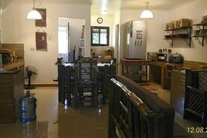 A cozinha ou kitchenette de A Filipino Rustic Style Duplex in Rosario, Cavite UNIT A