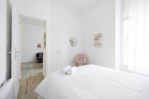Posteľ alebo postele v izbe v ubytovaní Le Concorde 1 - Appartement 1 chambre Terrasse Clim Calanques Vélodrome