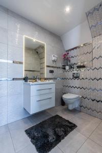 Kúpeľňa v ubytovaní Gąsienica Apartamenty Queen