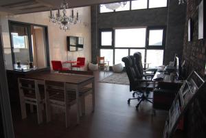 Area soggiorno di Dynamic Guesthouse