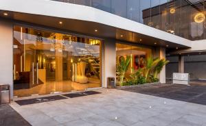 a store front of a building with large windows at The Art Hotel in Lagos