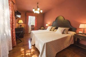 Posteľ alebo postele v izbe v ubytovaní Hotel Emblemático San Marcos