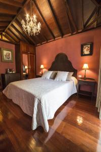 Posteľ alebo postele v izbe v ubytovaní Hotel Emblemático San Marcos