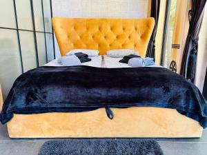 Cama ou camas em um quarto em Crusoe Zakopane