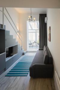 Posteľ alebo postele v izbe v ubytovaní Gallery Duplex Studio