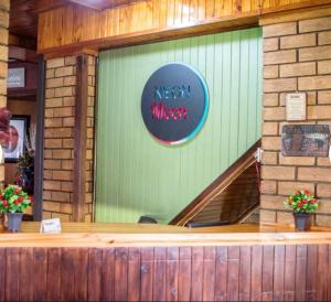 a new mindset sign on the window of a restaurant at Neon moon in Welkom