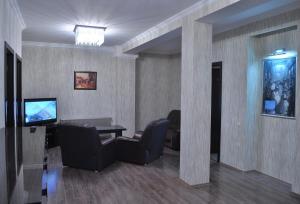 TV a/nebo společenská místnost v ubytování Rondo Hotel
