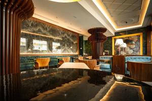 Posezení v ubytování Hotel Dauro Premier