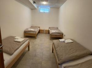 Letto o letti in una camera di Penzion YORK