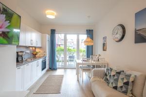 Гостиная зона в Wohnen am Südstrand - Ferienwohnung 0 4 +238 фотографий