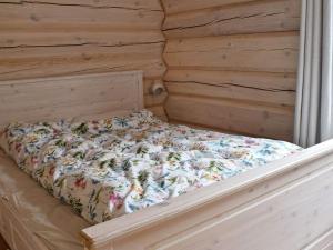 מיטה או מיטות בחדר ב-Holiday home HURDAL