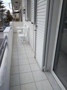 A balcony or terrace at Comfort 2 bd Apt, close to Airport-Heraklion/Crete