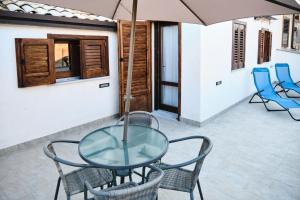 A patio or other outdoor area at Mercede Rooms