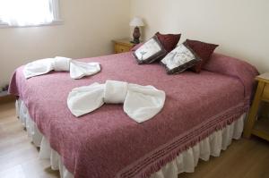 Una cama o camas en una habitación de Hotel Turingia