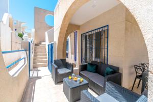 Posezení v ubytování VILLA-CAPRICHO DUNAS DE LA MATA 3 + 11 fotografií