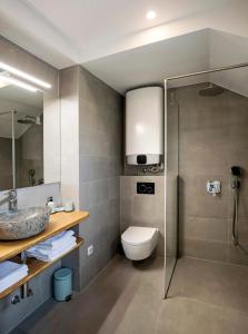 Ett badrum på Apartments Vila Apolonia