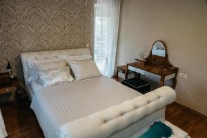 Postel nebo postele na pokoji v ubytování Backyard Novi Sad + 5 fotografií