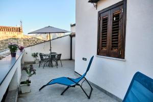 A balcony or terrace at Mercede Rooms