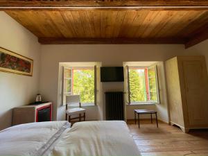 Кровать или кровати в номере La Casermetta
