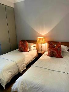 Ein Bett oder Betten in einem Zimmer der Unterkunft Luxury Beach Villa (On the Beach)